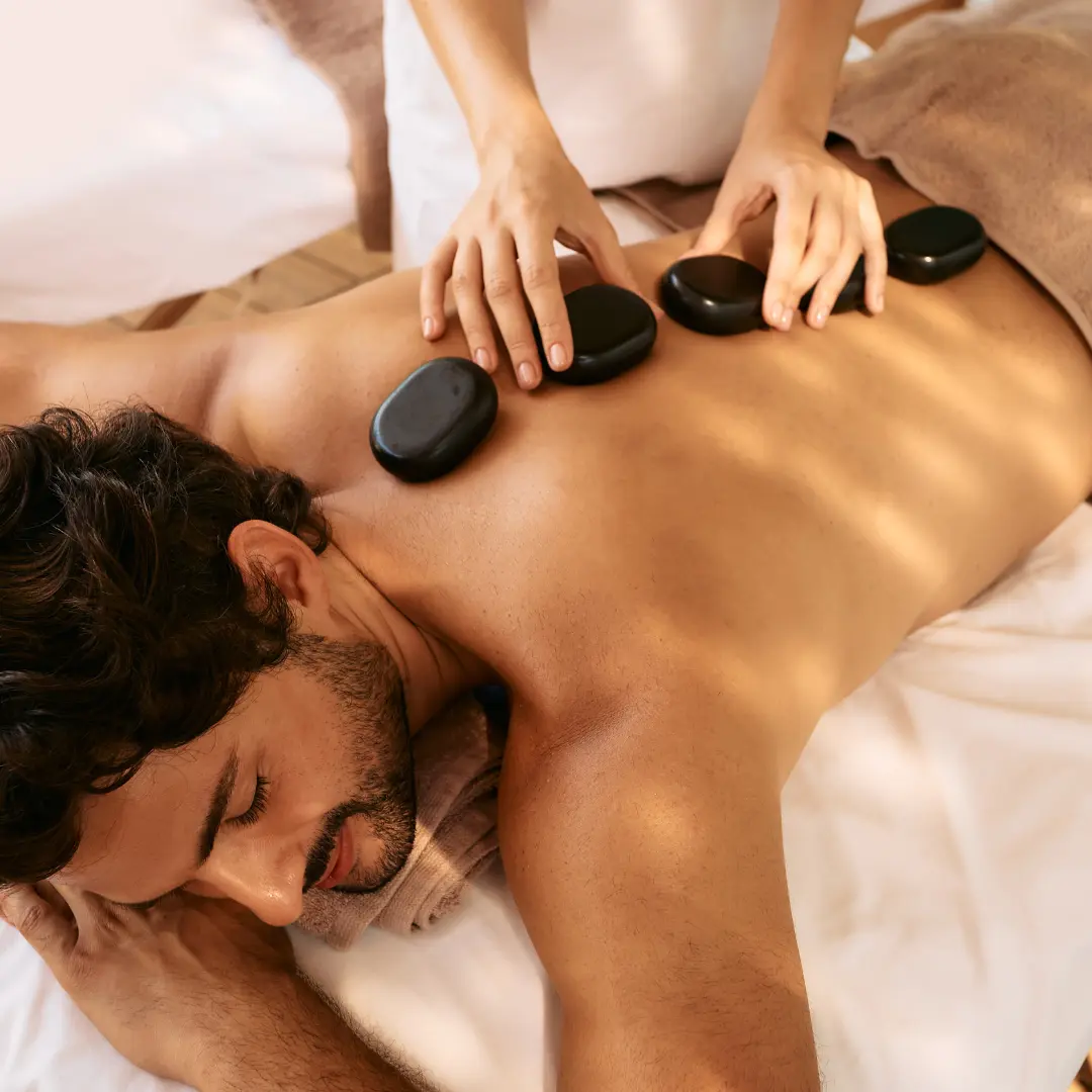 Masaje de Tejido Profundo con Piedras Calientes